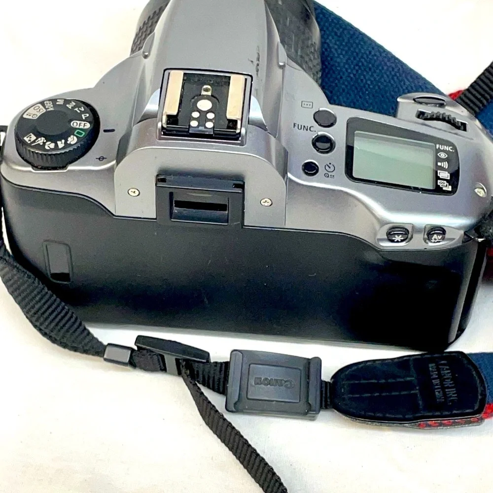 Canon EOS Rebel GII 35mm SLR Camera - Silver & Black with shoulder strap